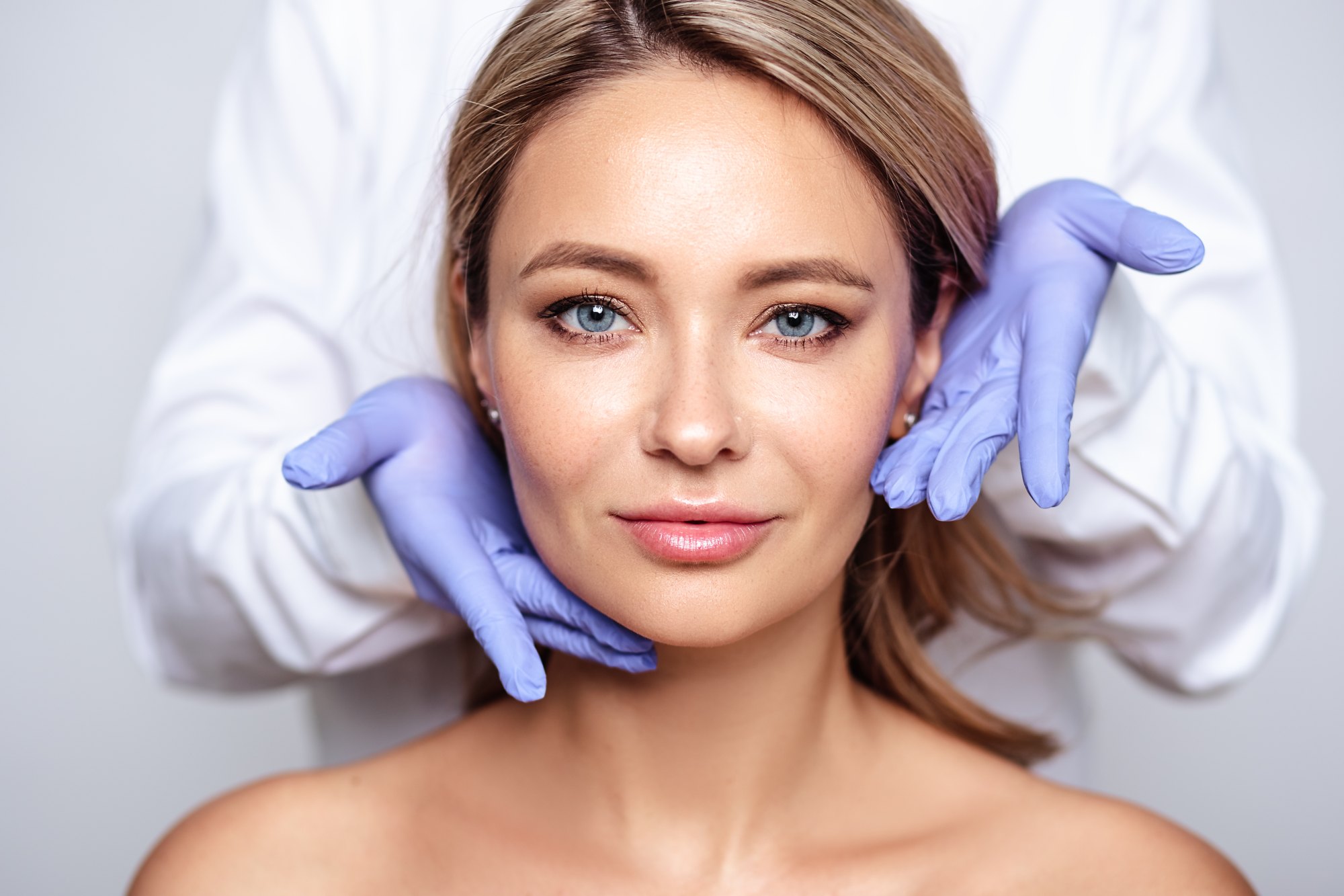 Woman receiving non-surgical aesthetic care